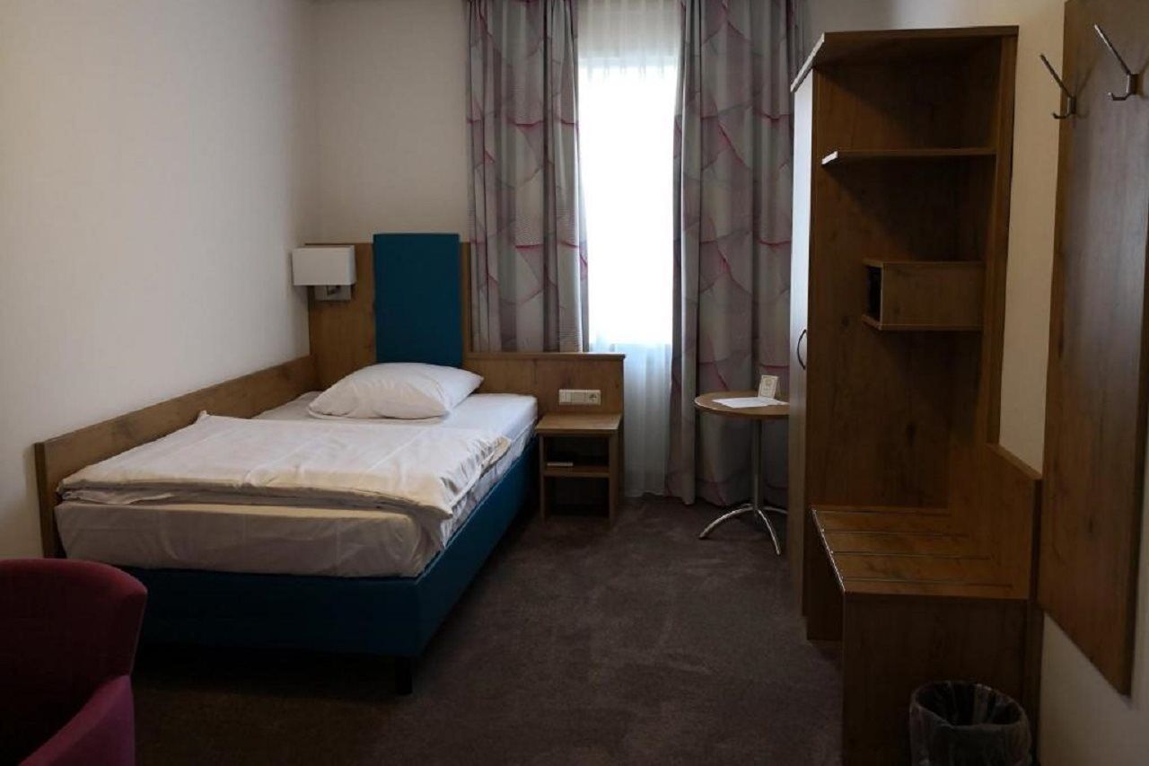 호텔 바이에른 호프 뮌헨 외부 사진 A typical room at the hotel